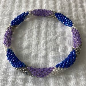 Purple, blue, white and silver beaded non stretch, roll on bracelet, like new